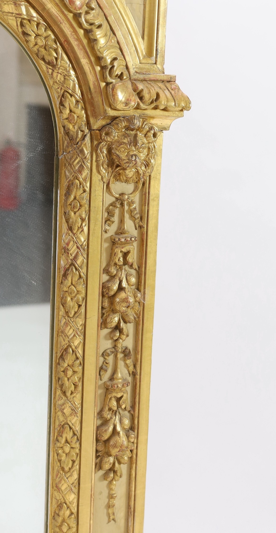 A late 19th century French carved giltwood wall mirror, W.146cm H.171cm